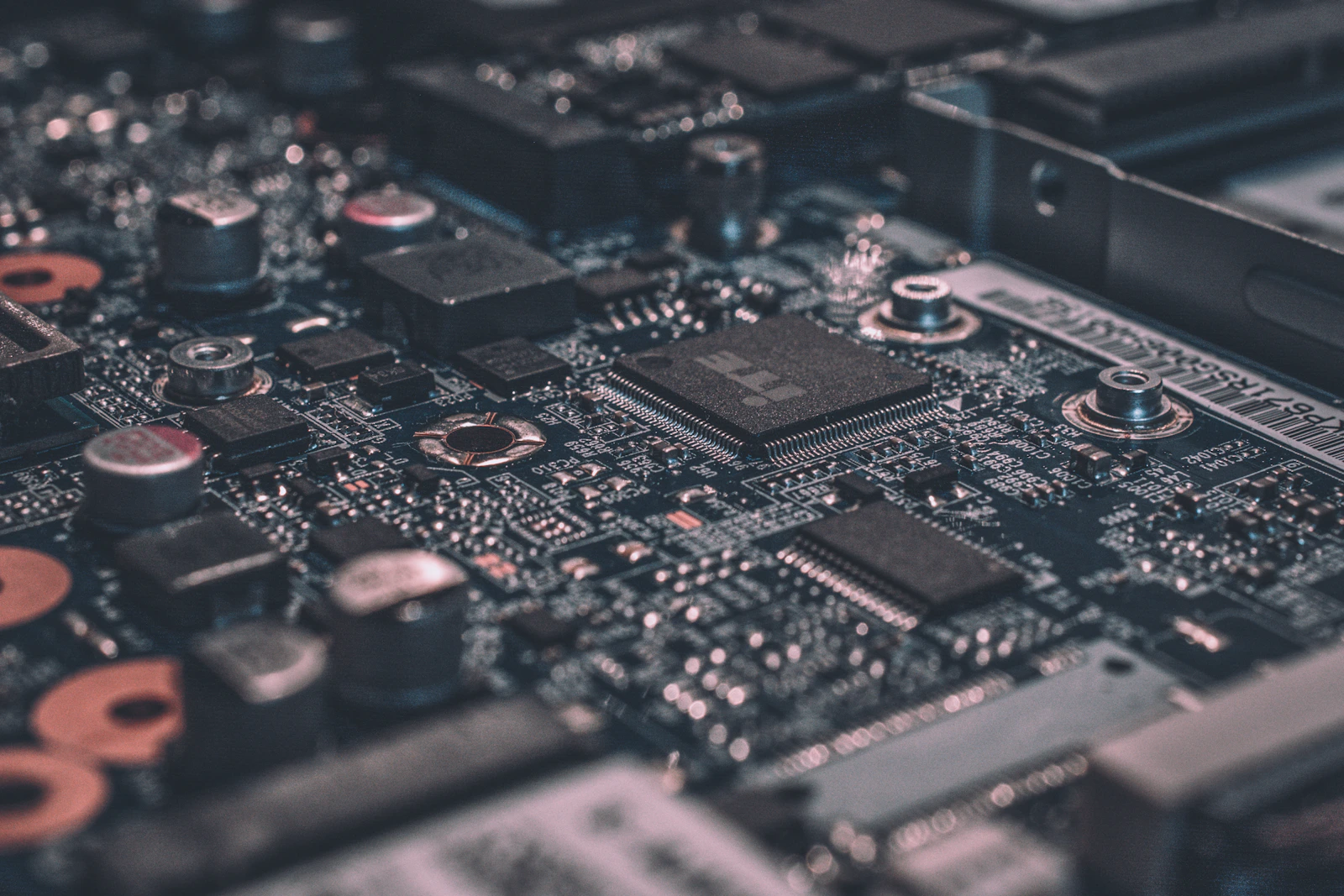 Close view of a circuit board with fine blue traces
